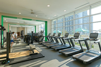 Fitness center with a row of treadmills